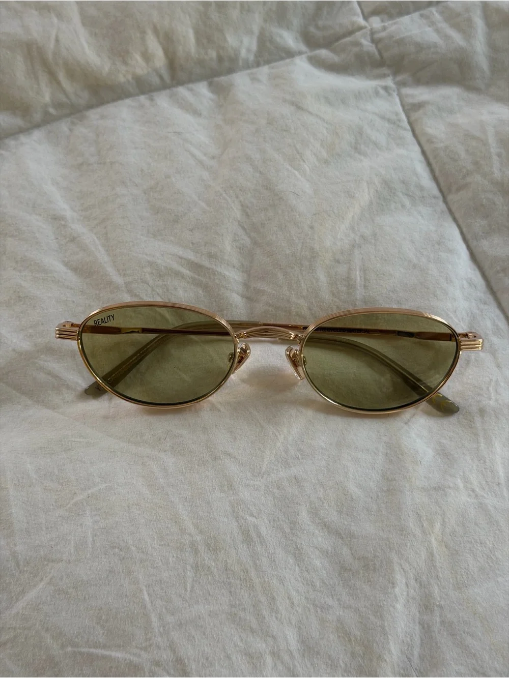 Reality eyewear Oval Gold Frame Sunglasses with Olive Green Lenses promise land